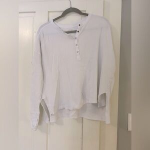 Aerie flows off the shoulder white top